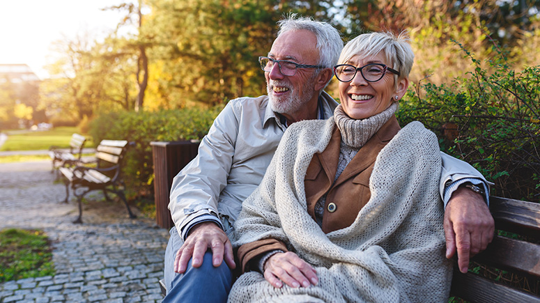 Senior couple on a bench.